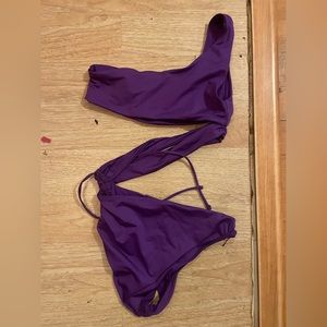 Purple one piece bathing suit with cutouts